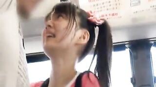 japanese schoolgirl gives a handjob to a stranger in a bus