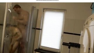 giant muscle man shower with tiny small guy