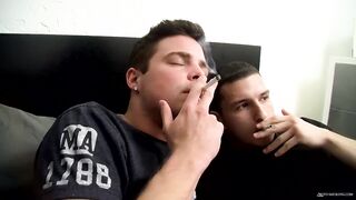 Two gay guys smoking cigarettes, sucking cock and swallow