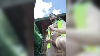 Construction worker jerking on the job