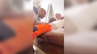 Construction worker giving his buddy a blowjob