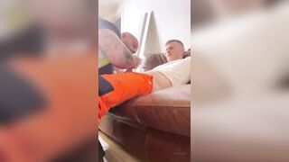 Construction worker giving his buddy a blowjob